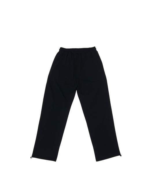 Track Pants detail showing tapered relaxed fit and ankle zip feature