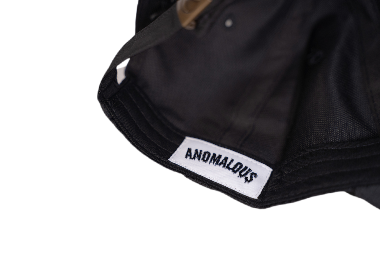 Black cap embroidery detail - Anomalous premium headwear