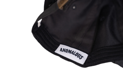 Black cap embroidery detail - Anomalous premium headwear